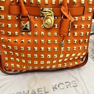 Authentic Orange Michael Kors, gold studded handbag!!